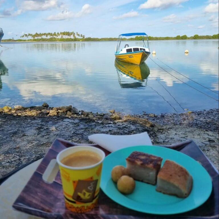 Sipping Tea by the seaside of Addu City. Addu hedhikaa is most popular snack in the Maldives